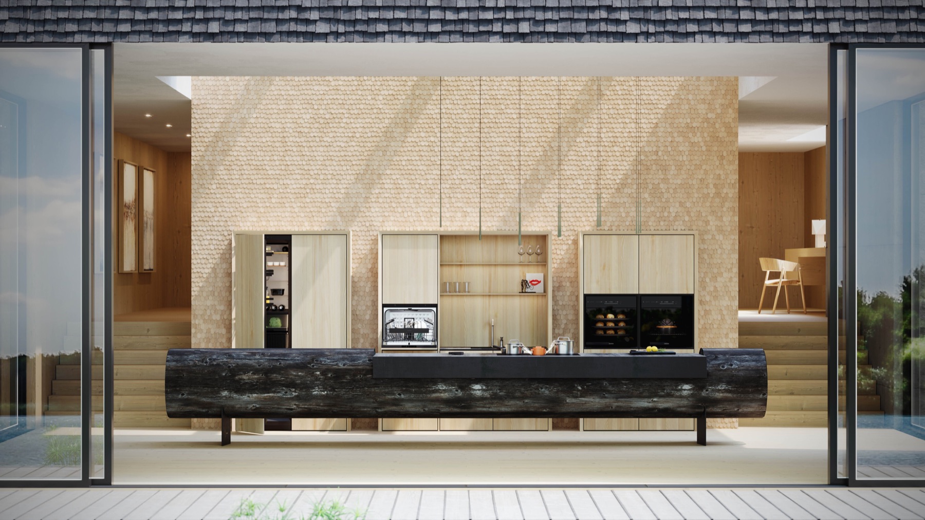 Cocina abierta al exterior con isla y equipos BORA